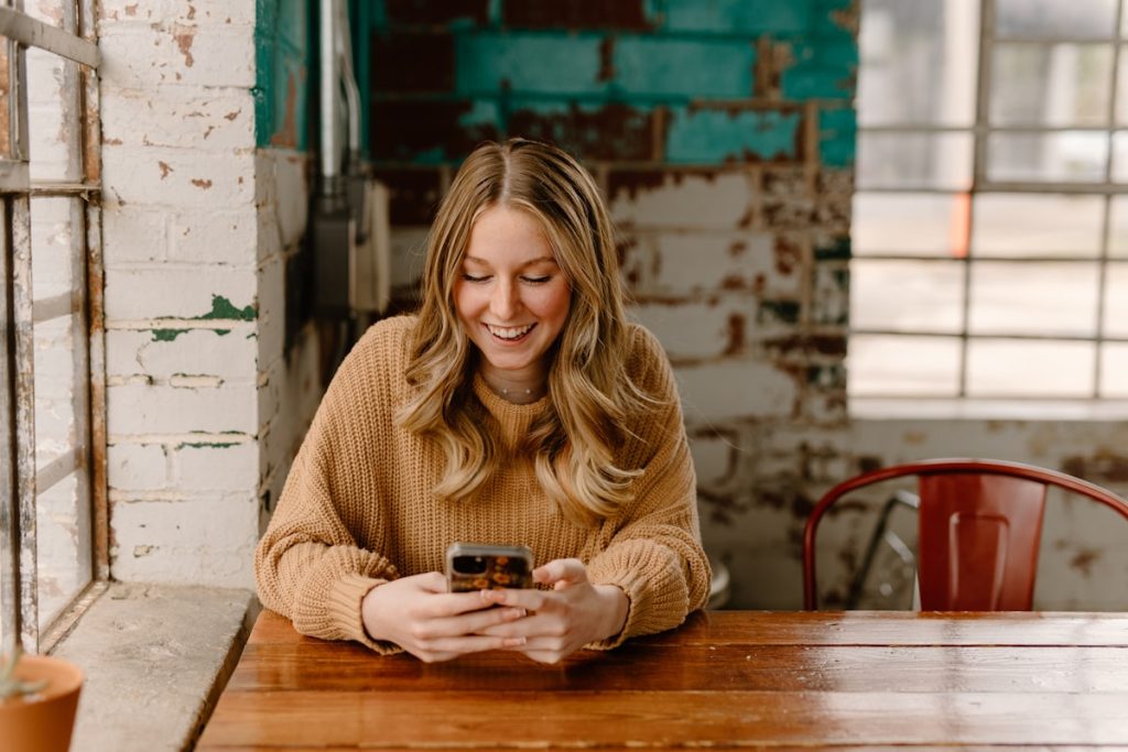 Person searching for an orthodontist on a smartphone