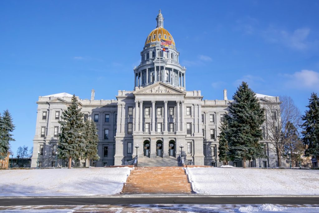 The gold domed Colorado State Capitol in Denver, where the Dental Practice Act was renewed in 2025